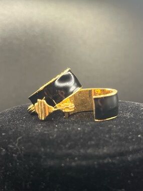Vintage Monet Gold Tone Black Enamel Clip On Earrings